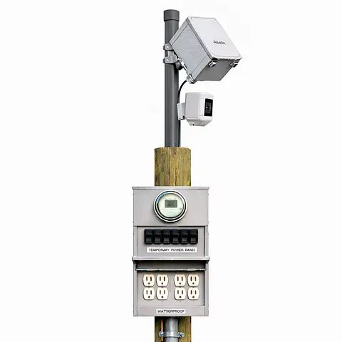 Jobsite Connect security camera and Starlink satellite internet equipment mounted on a construction site temp power pole
